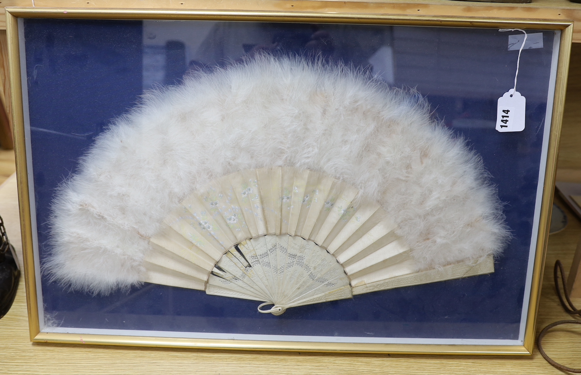 A cased bone, silk and swans down fan, 62cm wide